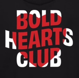 Close up of graphic: a red heart and words "Bold Hearts Club" printed over it.