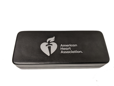 Black leatherette box with American Heart Association logo printed on it in white