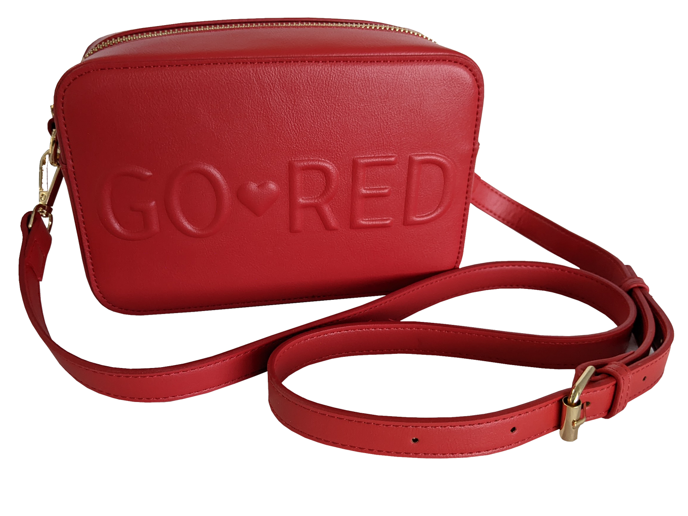 Red purse with gold zipper, claps, and strap buckle. "Go Red" with a small heart in between the words embossed in the center of the rectangle purse. 