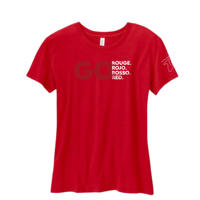 Red short sleeve crewneck ladies tee with GO large front center and smaller white distressed text stacked to the right that say: ROUGE. ROJO. ROSSO. RED. Go Red logo on sleeve