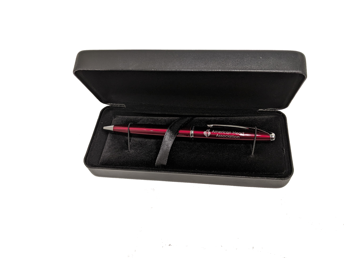 Black leatherette pen box with red AHA pen inside.