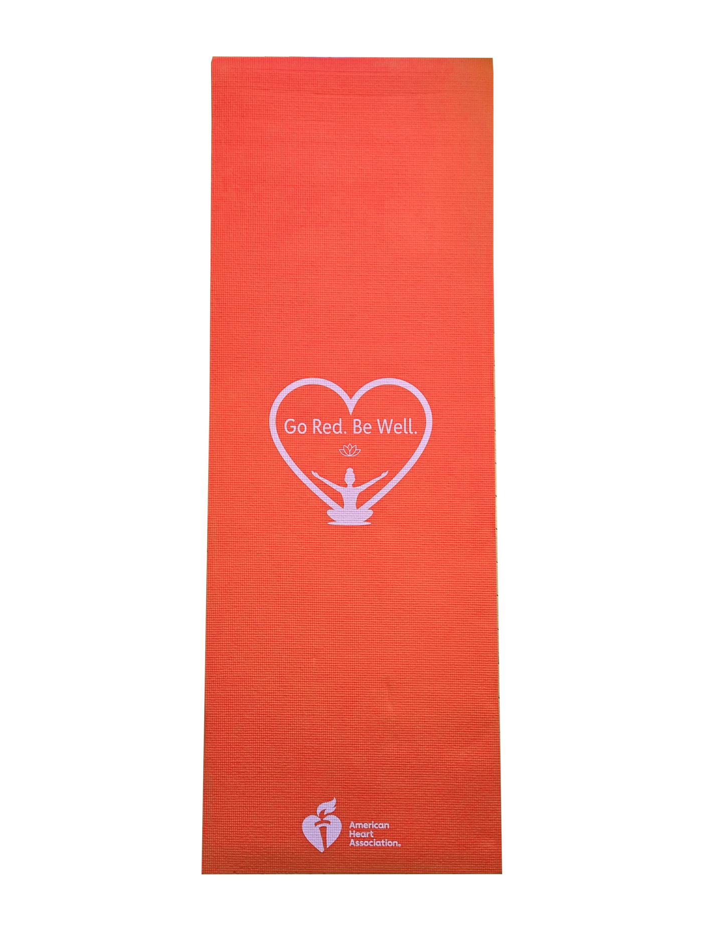 Showing full unrolled mat with center white heart outline "Go Red. Be Well." design and AHA logo feature on bottom of mat.