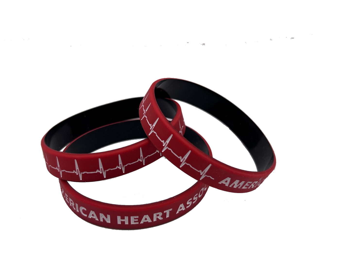 stack of 3 wristbands, red with black on inside. Printed on outside with white EKG line and "American Heart Association"