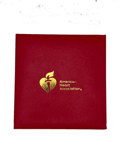 top of box lid featuring AHA logo in gold - hot stamped ink.